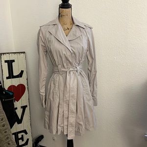 Mid length tan trench coat
